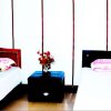 Отель Xingcheng Dasixi Family Inn, фото 3