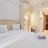 Отель Warm And Comfortable Studio Room At Sky House Bsd Apartment, фото 3