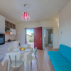 Отель Le Bianche Apartment 1 con giardino, фото 8