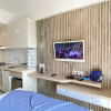 Отель Warm And Homey Studio At Sky House Alam Sutera Apartment, фото 3
