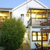 Отель Clovelly Lodge Guest Apartments, фото 8