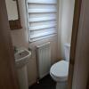 Отель Hot tub hols 3 bed caravan at 42 Kingfisher Court в Уаддингтон