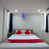 Отель OYO 18487 V Wella Inn, фото 18