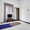 Отель Spot On 91745 Rumah Kost Gresik Syariah, фото 17