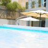 Отель Villa in TLV with a BIG YARD and POOL, фото 3