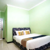 Отель SPOT ON 2729 Marzan Syariah Guest House, фото 5