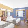 Отель Microtel Inn & Suites by Wyndham Chili/Rochester Airport, фото 11