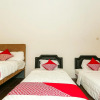 Отель OYO 1230 Kampoeng Osing Syariah Guesthouse, фото 3