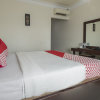 Отель OYO 1114 Hotel Denpasar Makassar, фото 10