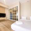 Отель Cozy And Simple Big Studio Vasanta Innopark Apartment, фото 1