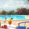 Отель Bungalow with 2 Bedrooms in Bouillante, with Wonderful Sea View, Shared Pool, Enclosed Garden - 70 M, фото 8