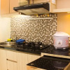 Отель Great Location And Simply Studio Room At Bassura City Apartment, фото 6