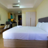 Отель Comfy Studio Room with City View at Menteng Park Apartment, фото 14