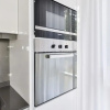 Отель Elegant 2BR with maids room and Ain View, фото 25