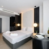 Отель EcoHeaven Suites, фото 5