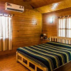 Отель Pele's Windsong Wood Cottage on the beach, фото 6