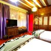Отель Lijiang Yuese Inn, фото 6
