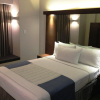Отель Microtel by Wyndham Acropolis, фото 4