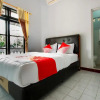 Отель OYO 3126 Penginapan Suka Asih, фото 25