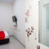 Отель Reddoorz Syariah Near Rs Mitra Keluarga Tegal, фото 12