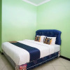 Отель SPOT ON 2729 Marzan Syariah Guest House, фото 13