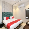 Отель OYO 17084 Hotel Grand Orchid, фото 7