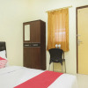 Отель OYO 265 Nurdiono House Kentungan, фото 4