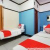 Отель OYO 3892 Athaya Guesthouse Syariah, фото 43