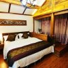 Отель Lijiang Yiran Ethnic custom Viewing Inn, фото 47