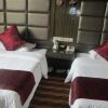 Отель Xishuangbanna Huixiang Business Hotel в Цзинхуне