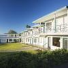Отель The Tides Oceanview Inn and Cottages, фото 1