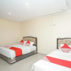 Отель OYO 184 Grand Putri Sriwijaya, фото 7