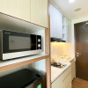 Отель Homey And Comfortable Studio At Enviro Apartment, фото 5