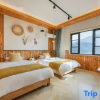 Отель Anji Chuanhe Holiday Homestay (Anji Yunshang Grassland Panda Tribe Adventure Park Branch), фото 3