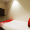 Отель OYO 49069 A Suites, фото 17