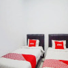 Отель SUPER OYO 91627 Wika Wiki Homestay, фото 17