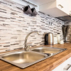 Отель Exceptionally Located Studio Apartment, фото 12