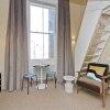 Отель Mezzanine Flat With Garden Views Near Regents Park, фото 8