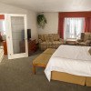 Отель Service Plus Inn and Suites - Grande Prairie, фото 3