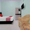 Отель OYO 90571 Dewi Guest House Syariah, фото 11
