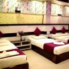 Отель Rooms with 1 king size bedded + 2 single Cart Beds + AC, фото 3