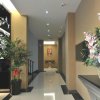 Отель Dongfang Huating Business Hotel, фото 1