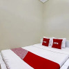 Отель OYO 92884 Agustha Homestay, фото 12