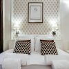 Отель Sweet Inn Apartments - Villa Jocelyn в Париже
