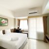 Отель Cozy Stay Studio Apartment At Gateway Park Lrt City Bekasi в Чипутате
