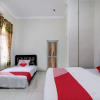 Отель OYO 90942 Kost Syari'ah Panam, фото 7