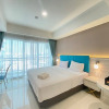 Отель Modern and Spacious Studio Room at Green Kosambi Apartment, фото 4