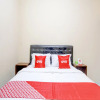 Отель OYO 90175 Tl Guest House, фото 7