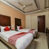 Отель OYO 16061 Hotel Holly Hock, фото 11