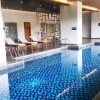 Отель Cozy Living And Spacious Studio At 28Th Floor Kemang Village Apartment, фото 1